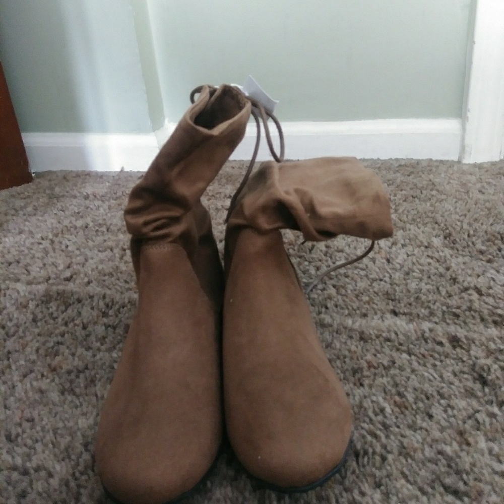 American Eagle Boots with ties on back. Brand New!